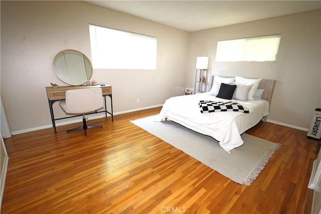 bedroom featuring hardwood / wood-style floors