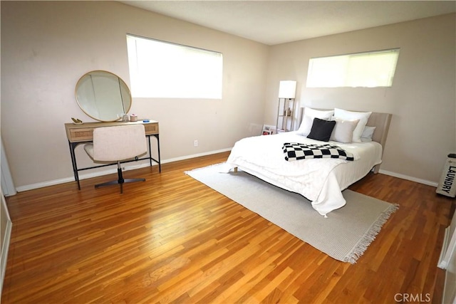 622 E Lomita Ave, Orange, CA 92867 - bedroom featuring wood finished floors and baseboards