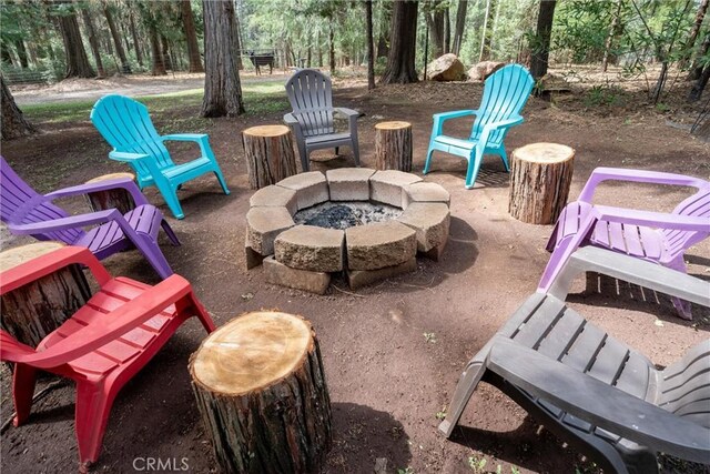 view of patio with an outdoor fire pit