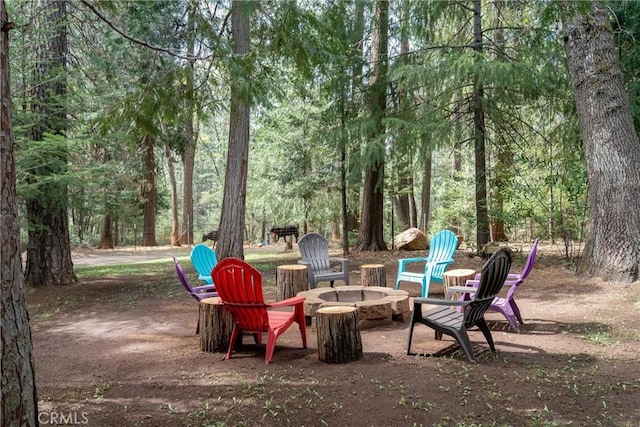 view of patio / terrace with an outdoor fire pit