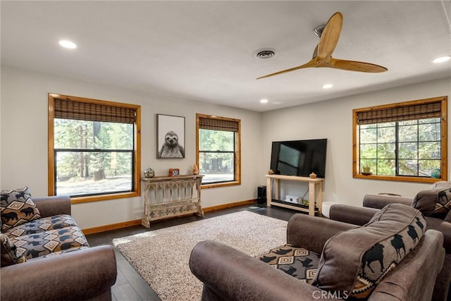 living area featuring visible vents, recessed lighting, and a healthy amount of sunlight