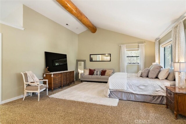 bedroom featuring carpet flooring and lofted ceiling with beams