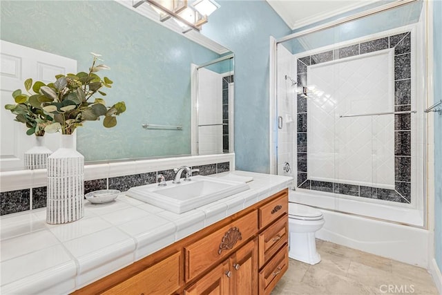 full bathroom featuring ornamental molding, bath / shower combo with glass door, vanity, tile patterned flooring, and toilet