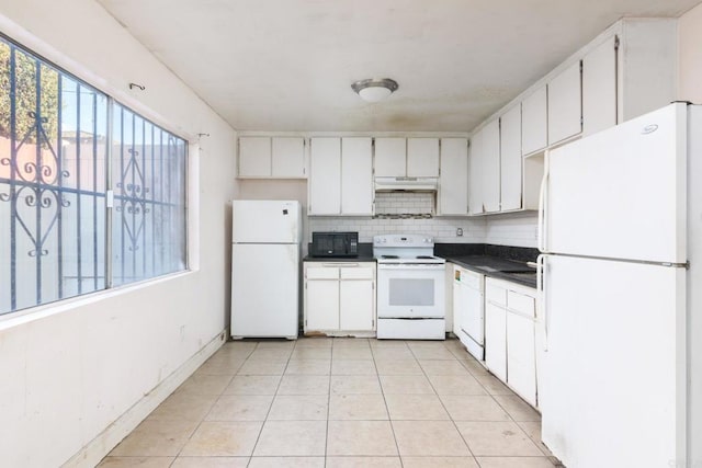 kitchen featuring light tile patterned flooring, white cabinetry, tasteful backsplash, and white appliances