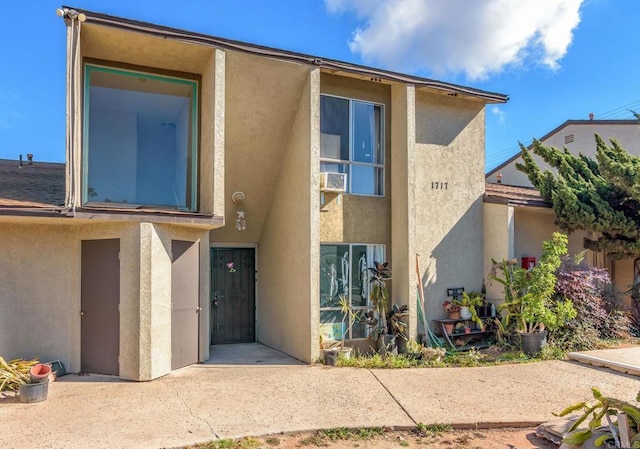 view of front of home featuring a patio