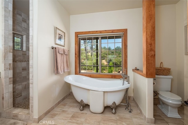 bathroom with independent shower and bath, toilet, and tile patterned floors