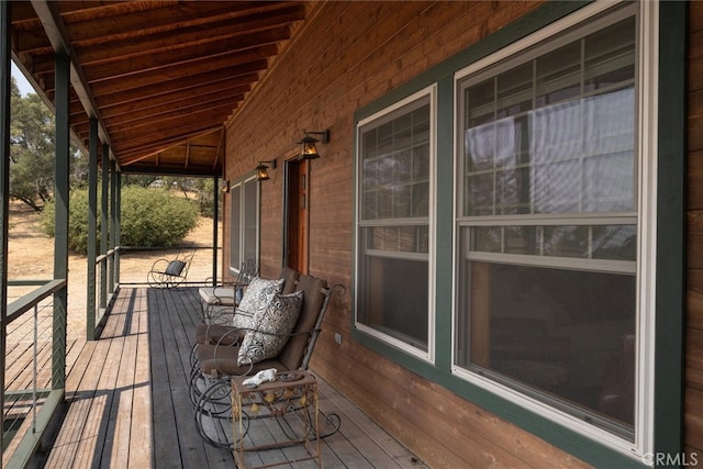 wooden deck featuring a porch