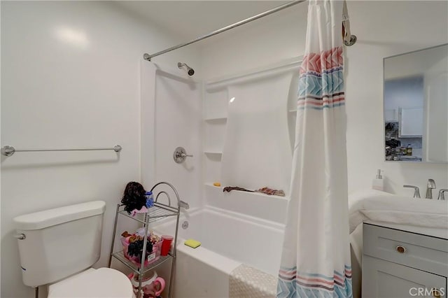 full bathroom with vanity, toilet, and shower / tub combo with curtain