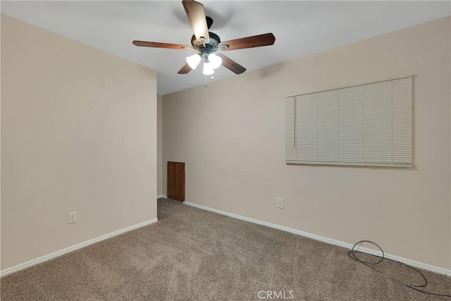 unfurnished room featuring light carpet and ceiling fan