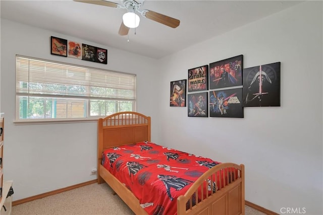 bedroom with multiple windows, carpet flooring, and ceiling fan