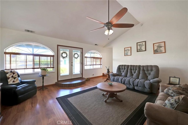 living room with french doors, ceiling fan, wood-type flooring, and high vaulted ceiling