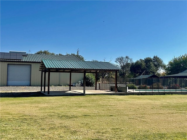 surrounding community featuring a gazebo and a yard