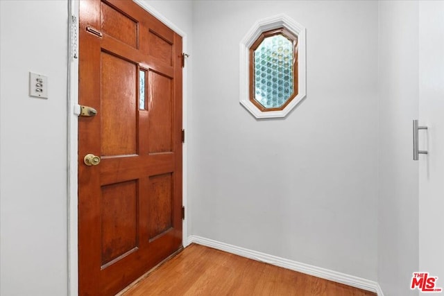 foyer with light hardwood / wood-style floors