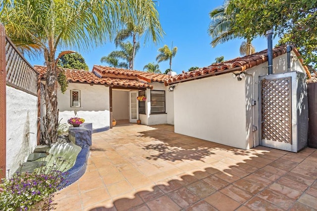 back of house featuring a patio