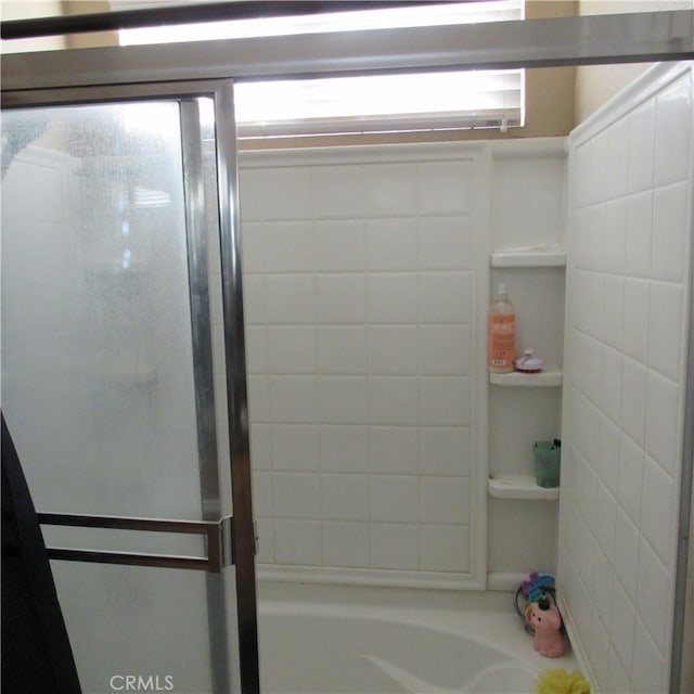 bathroom with a bathing tub