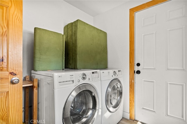 laundry area featuring washing machine and dryer