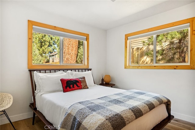 bedroom featuring hardwood / wood-style flooring