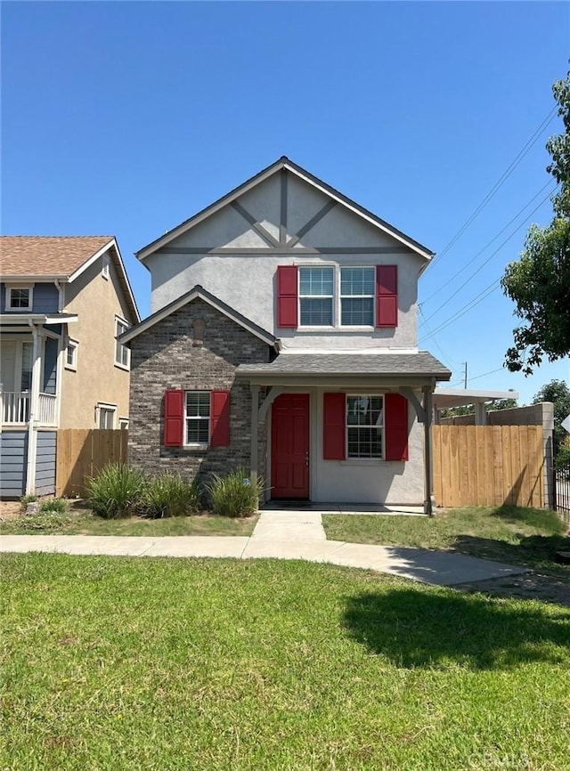 view of front of property featuring a front lawn