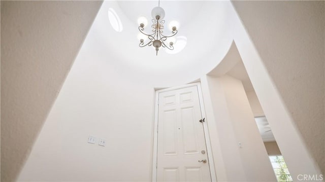 foyer with a notable chandelier