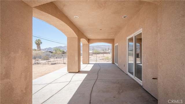 view of patio with a mountain view