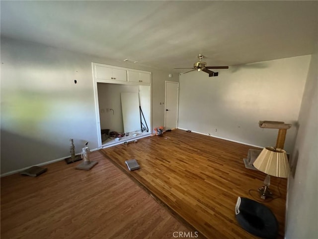 interior space with hardwood / wood-style flooring and ceiling fan