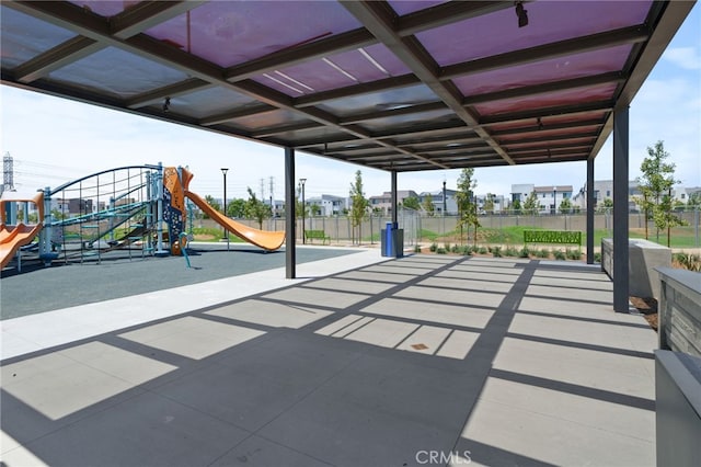 3570 E Peckham Paseo Unit 3, Ontario, CA 91761 - view of patio featuring fence and playground community