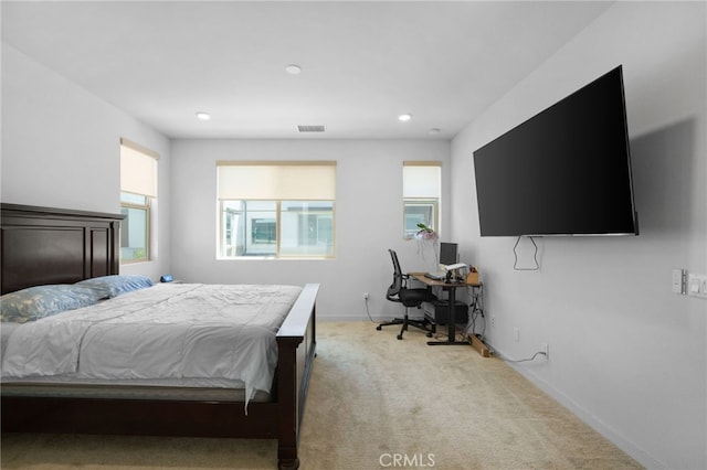 3570 E Peckham Paseo Unit 3, Ontario, CA 91761 - bedroom with light colored carpet, baseboards, visible vents, and recessed lighting