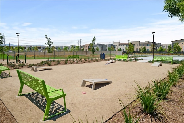 3570 E Peckham Paseo Unit 3, Ontario, CA 91761 - surrounding community with fence and a residential view