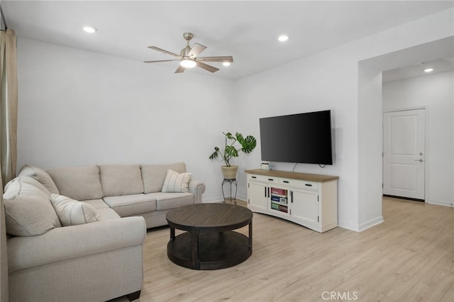 3570 E Peckham Paseo Unit 3, Ontario, CA 91761 - living room with light wood-style floors, a ceiling fan, and recessed lighting