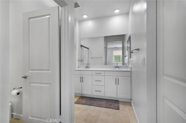 3570 E Peckham Paseo Unit 3, Ontario, CA 91761 - full bath featuring a sink, tile patterned floors, double vanity, and visible vents