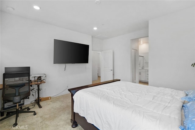 3570 E Peckham Paseo Unit 3, Ontario, CA 91761 - bedroom featuring ensuite bathroom, recessed lighting, and light colored carpet