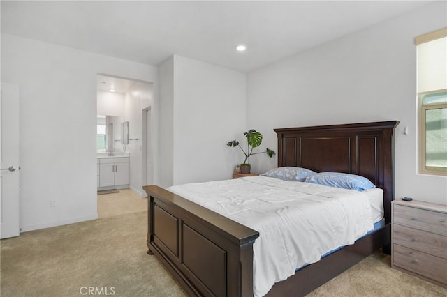 3570 E Peckham Paseo Unit 3, Ontario, CA 91761 - bedroom featuring light colored carpet, recessed lighting, ensuite bath, and multiple windows
