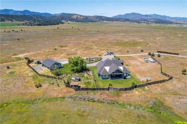 aerial view featuring a rural view and a mountain view