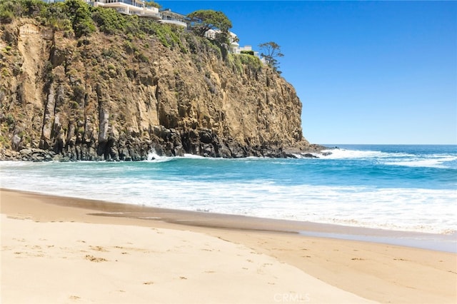 view of water feature featuring a beach view