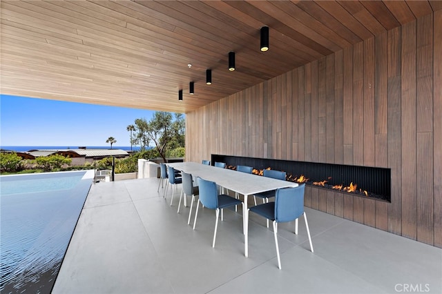 view of patio / terrace with a water view