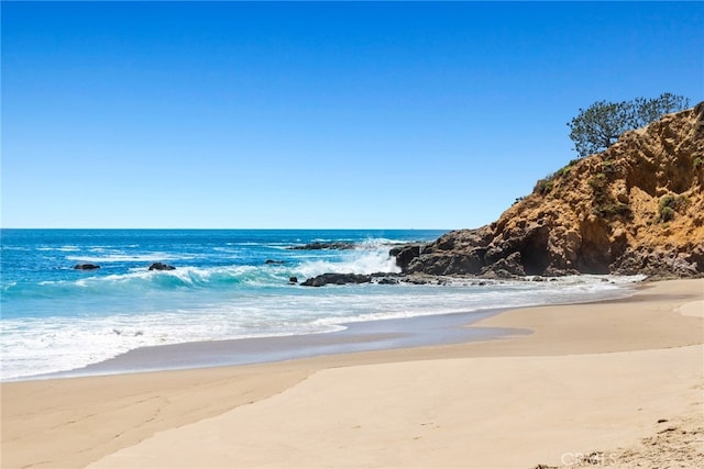 property view of water with a beach view