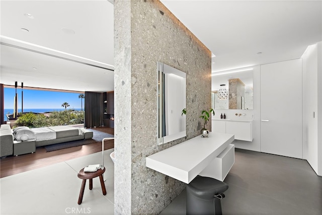 hallway featuring concrete flooring