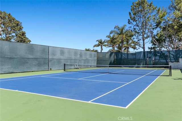 view of sport court featuring basketball hoop