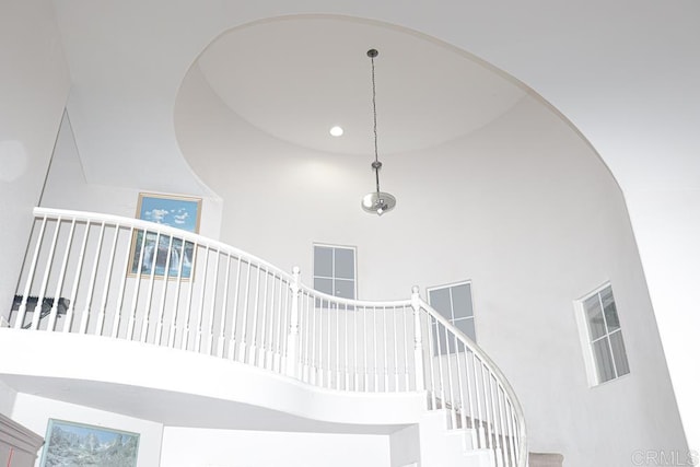 stairs with a towering ceiling