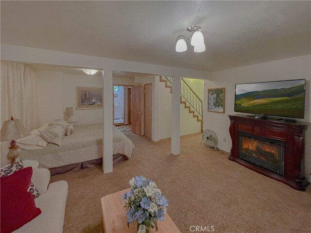 bedroom featuring light carpet