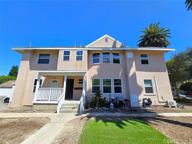 view of front of property featuring covered porch