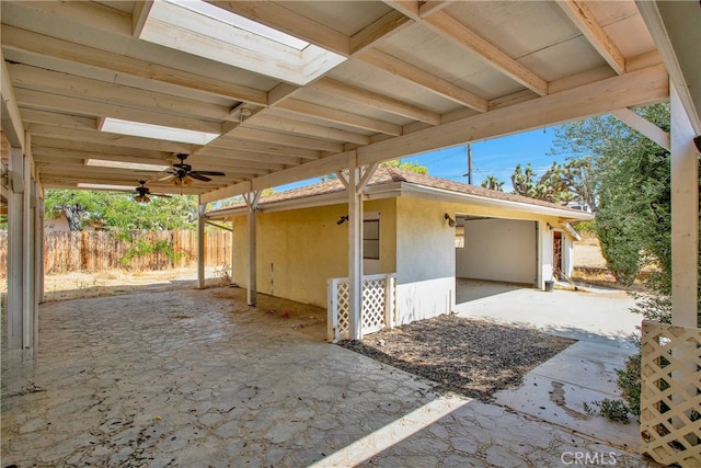 view of patio featuring ceiling fan