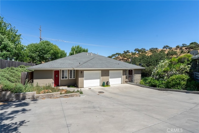 single story home featuring a garage