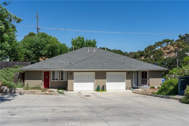 ranch-style home with a garage