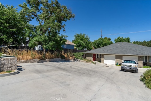 exterior space with a garage