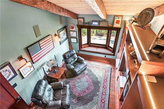 living room with wood ceiling, beam ceiling, and hardwood / wood-style floors