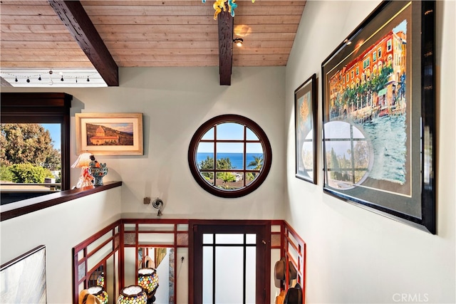 room details featuring wood ceiling and beam ceiling