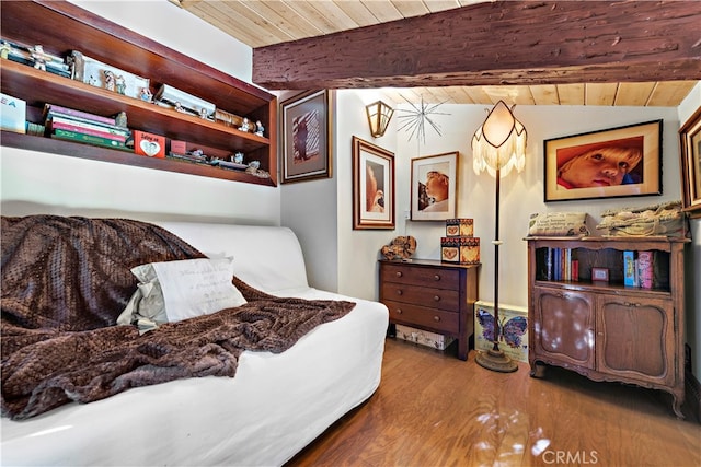 bedroom with wood-type flooring, wood ceiling, and lofted ceiling with beams