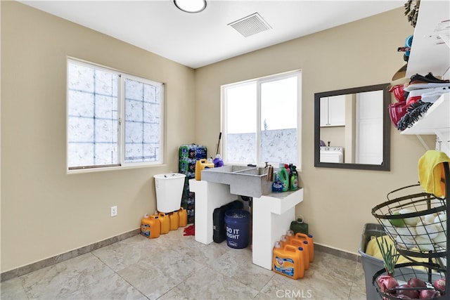 office featuring washer / dryer and plenty of natural light