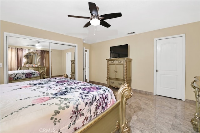 bedroom with a closet and ceiling fan